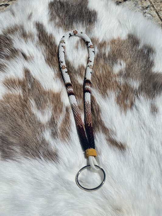 Neutral garden wristlet